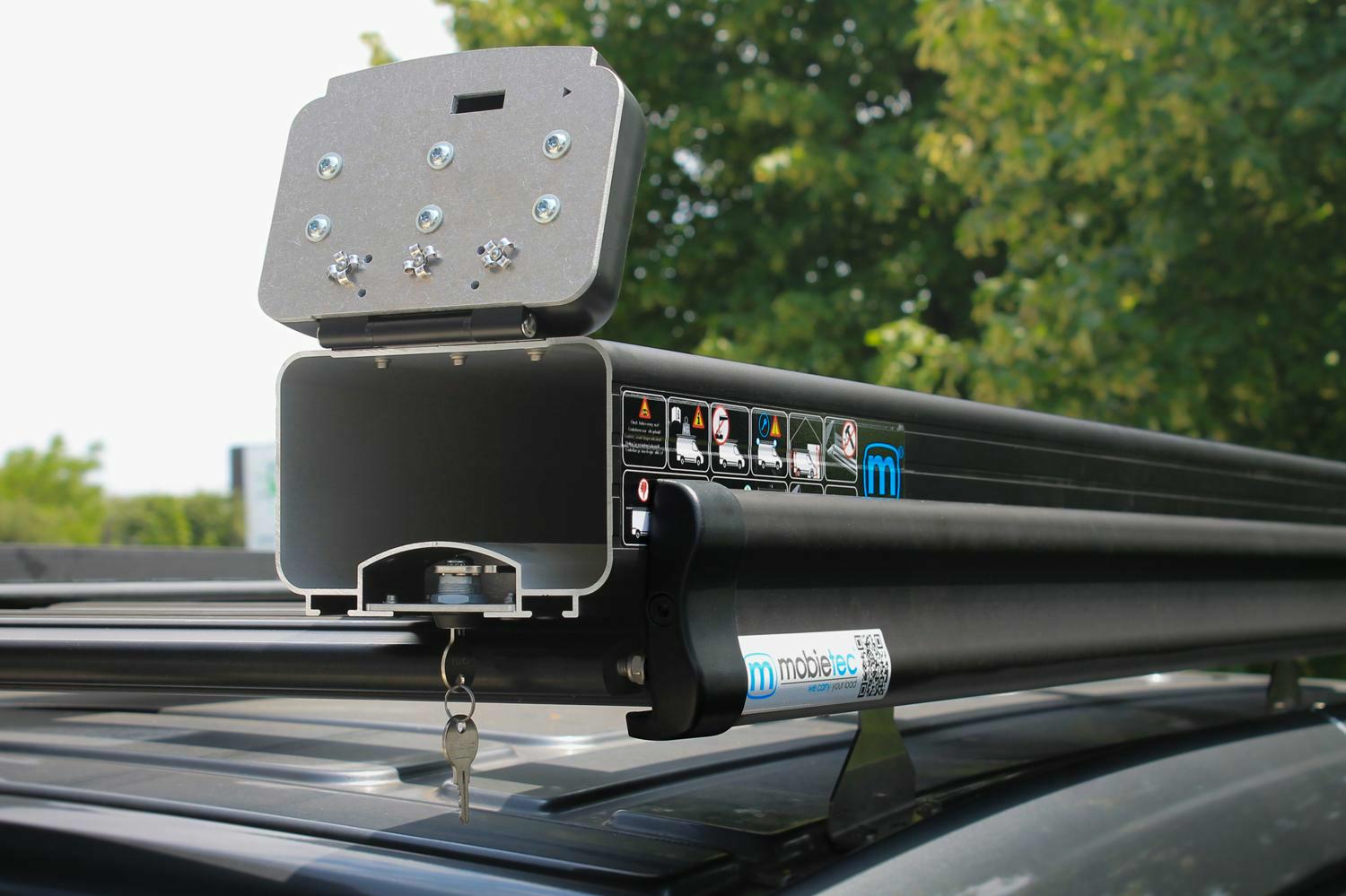 On a roof rack or load carriers